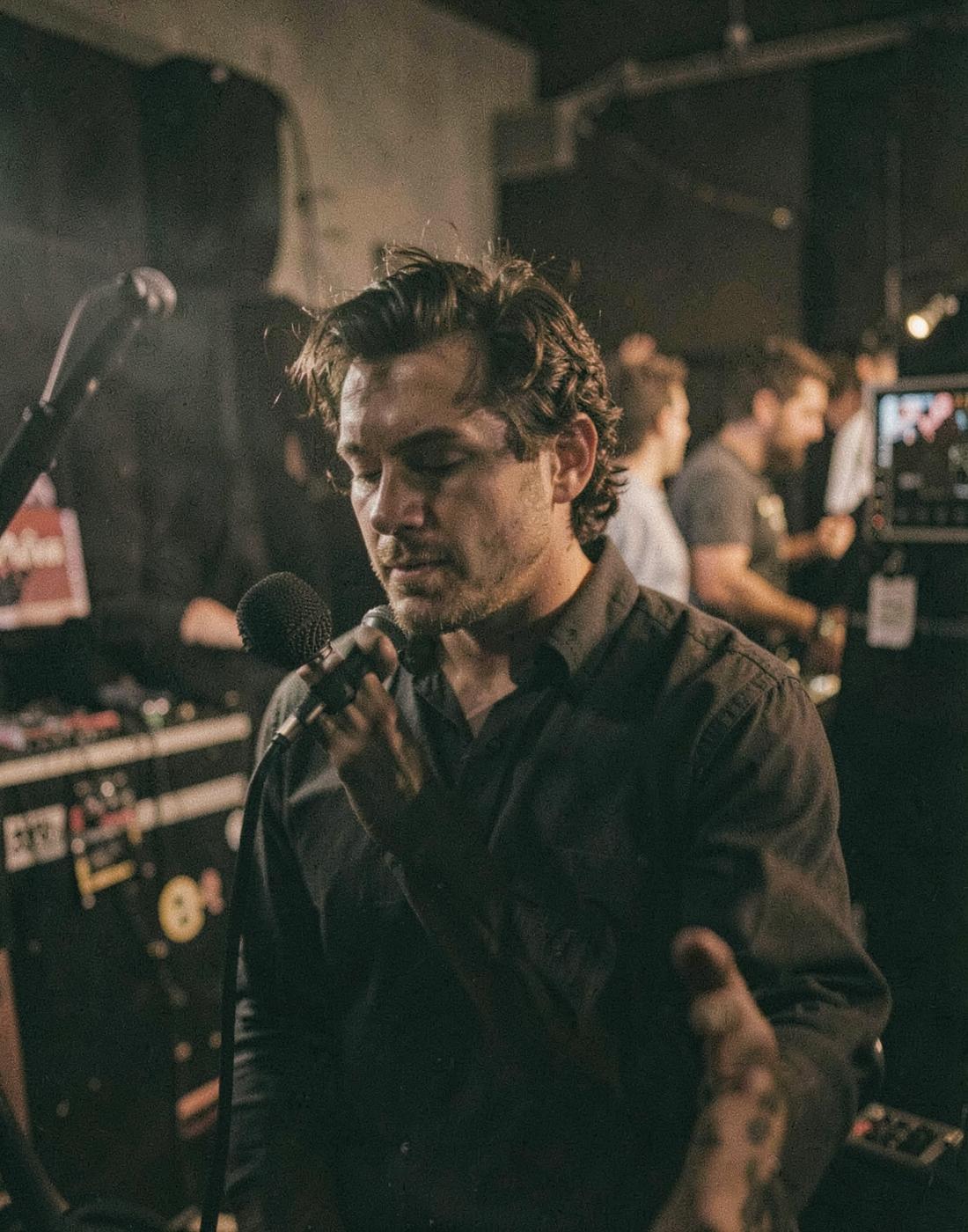 Candid backstage portrait of a musician